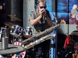 Bari - harmonica playing